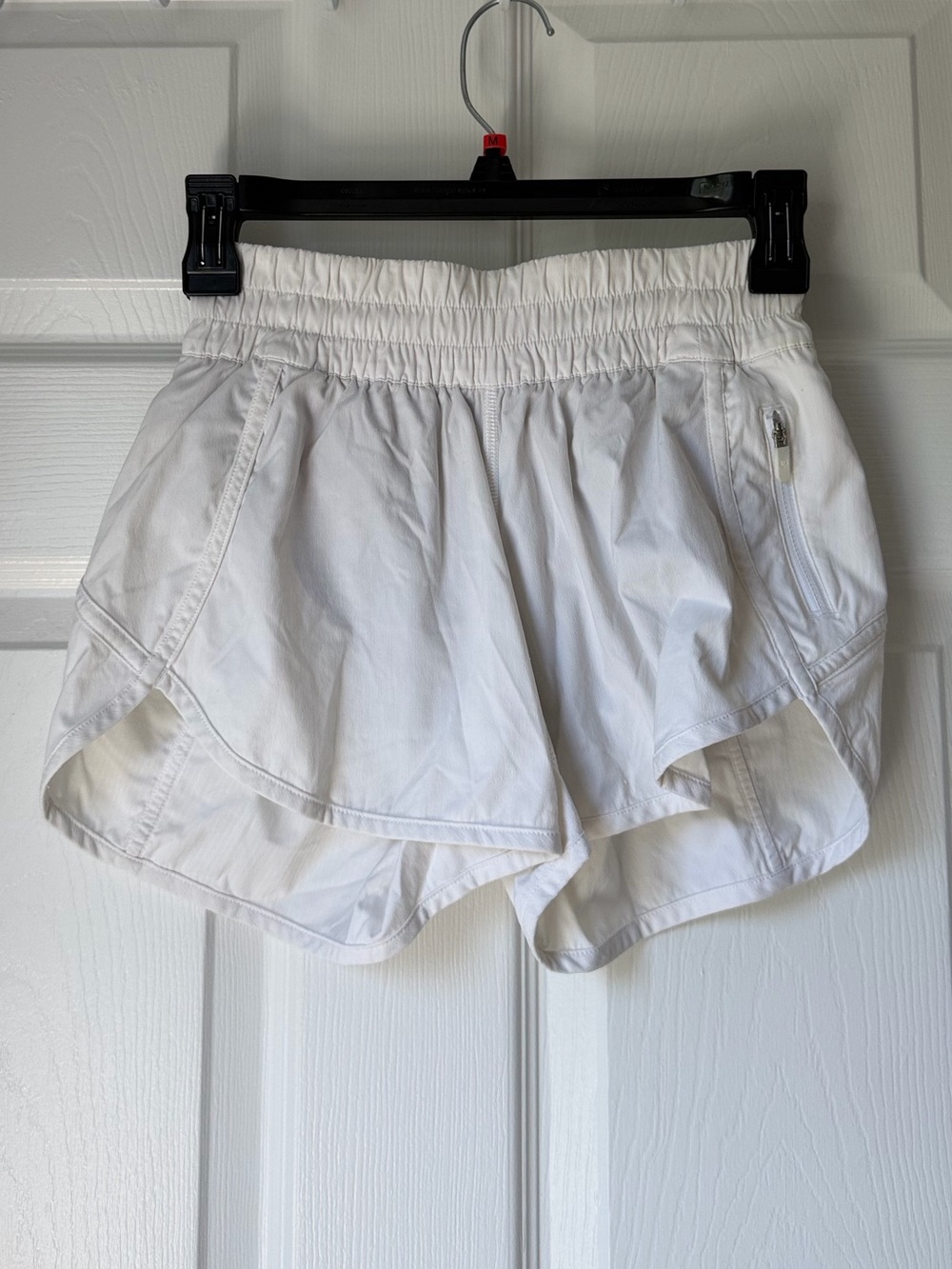 Lululemon track that short in white size 4